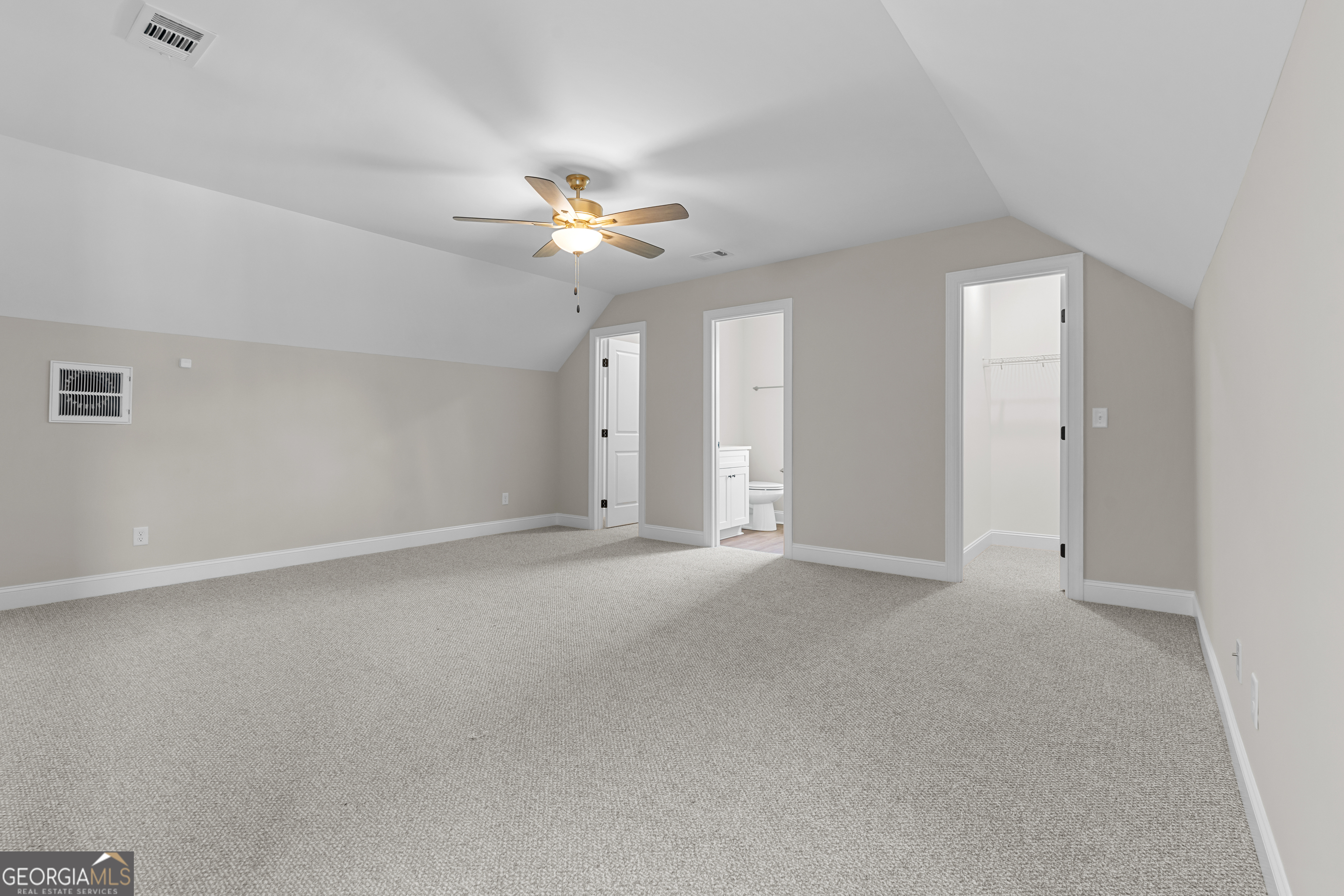 9 Honeysuckle Way Claxton, GA 30417 - Photo 71 of 84 an empty room with chandelier fan and windows