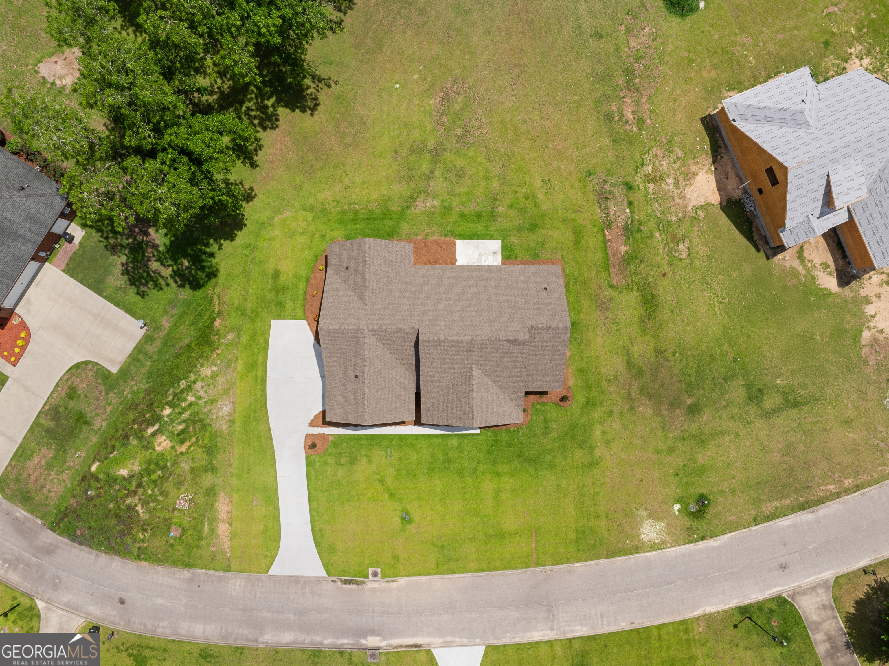 9 Honeysuckle Way Claxton, GA 30417 - Photo 78 of 84 an aerial view of a house with a yard