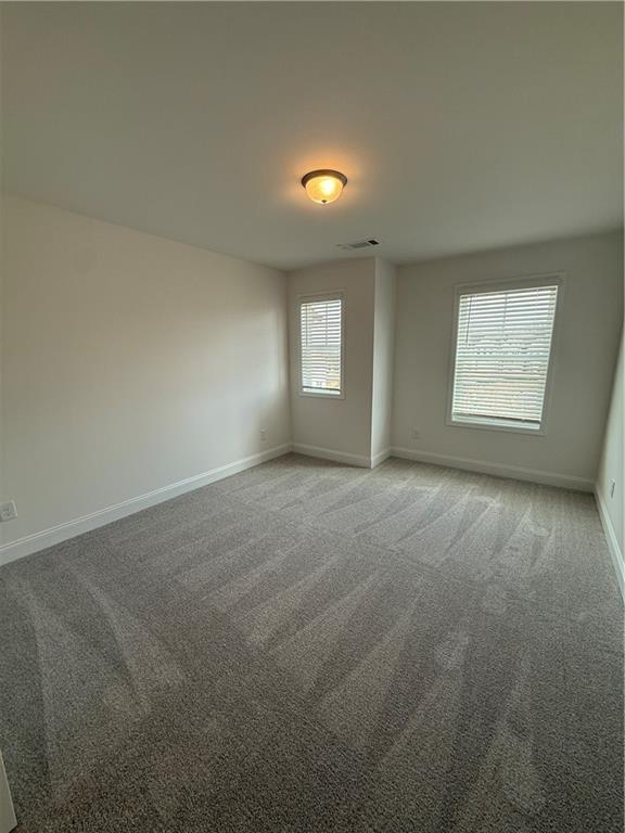 3979 Streamlet Way, Unit 153 Gainesville, GA 30506 - Photo 11 of 17 an empty room with a window