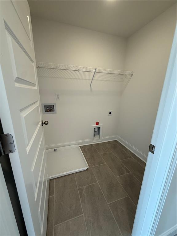 3979 Streamlet Way, Unit 153 Gainesville, GA 30506 - Photo 13 of 17 a view of a room with racks on the wall