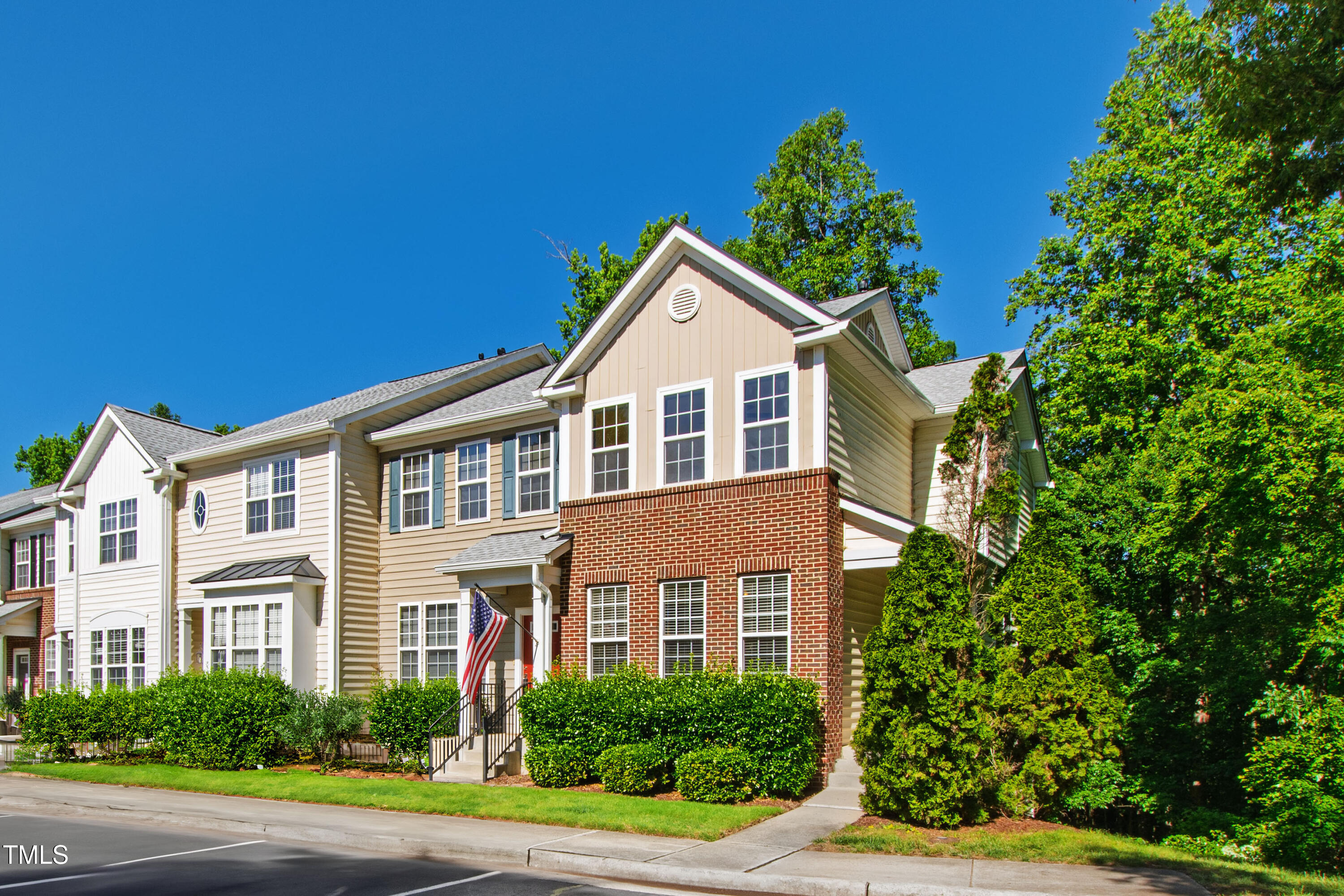 7761 Winners Edge Street Raleigh, NC 27617 - Photo 2 of 44 a front view of a house with a yard