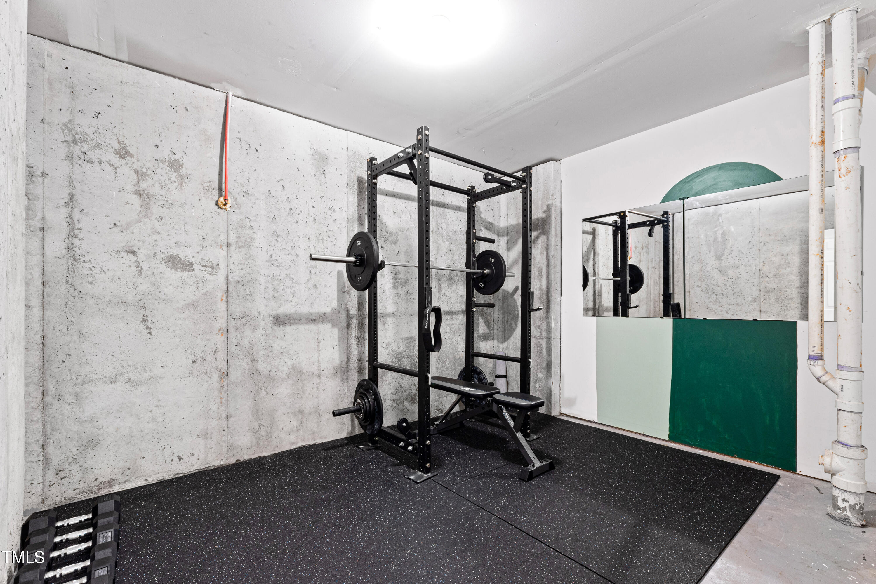 7761 Winners Edge Street Raleigh, NC 27617 - Photo 35 of 44 a view of a room with gym equipment