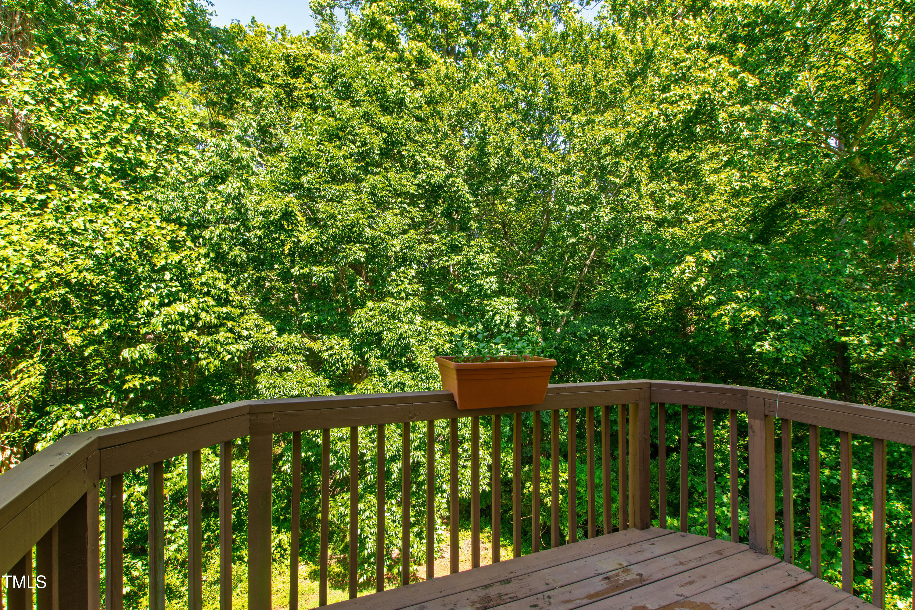 7761 Winners Edge Street Raleigh, NC 27617 - Photo 36 of 44 a balcony with wooden floor