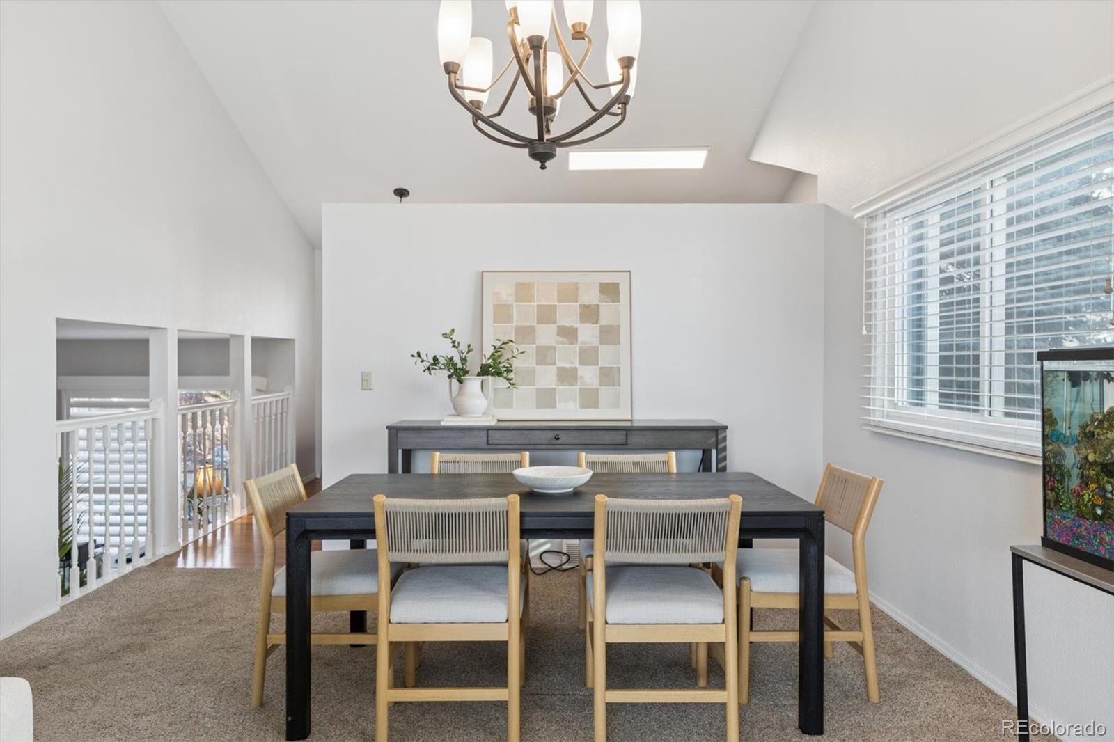 7191 Palisade Drive Highlands Ranch, CO 80130 - Photo 7 of 39 a view of a dining room with furniture and window