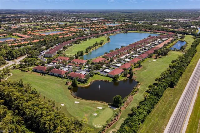 an aerial view of a residential houses and outdoor space