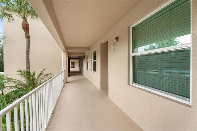 a view of a porch and garden