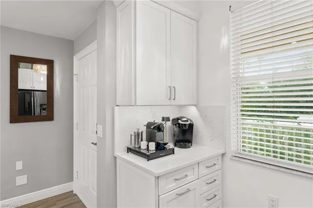 a view of a dining room and chairs in a kitchen