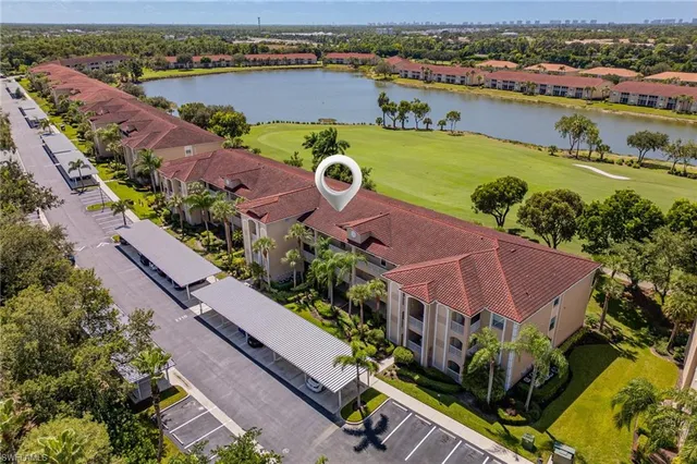 an aerial view of a house with a outdoor space