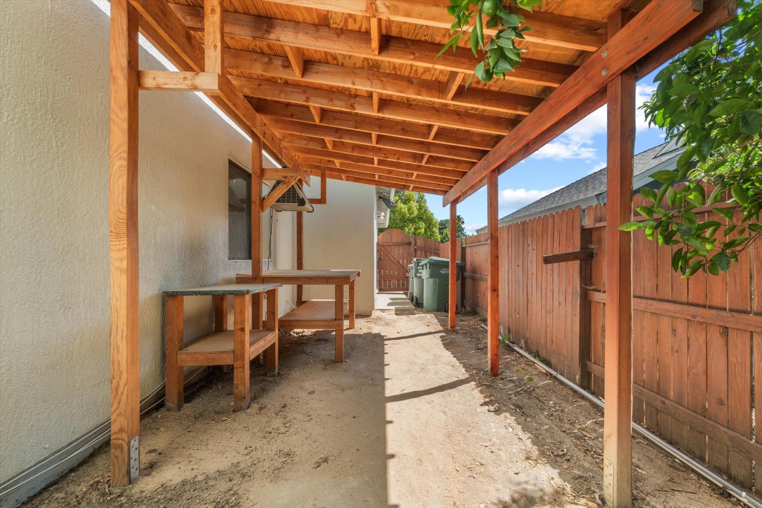 3921 Simi Valley Way Antelope, CA 95843 - Photo 30 of 34 Dedicated potting bench provides the perfect workspace for gardening, planting, and outdoor projects.