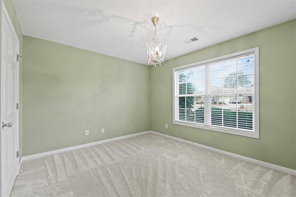 1218 Morgans Run Monroe, GA 30656 - Photo 20 of 39 a view of an empty room with a window