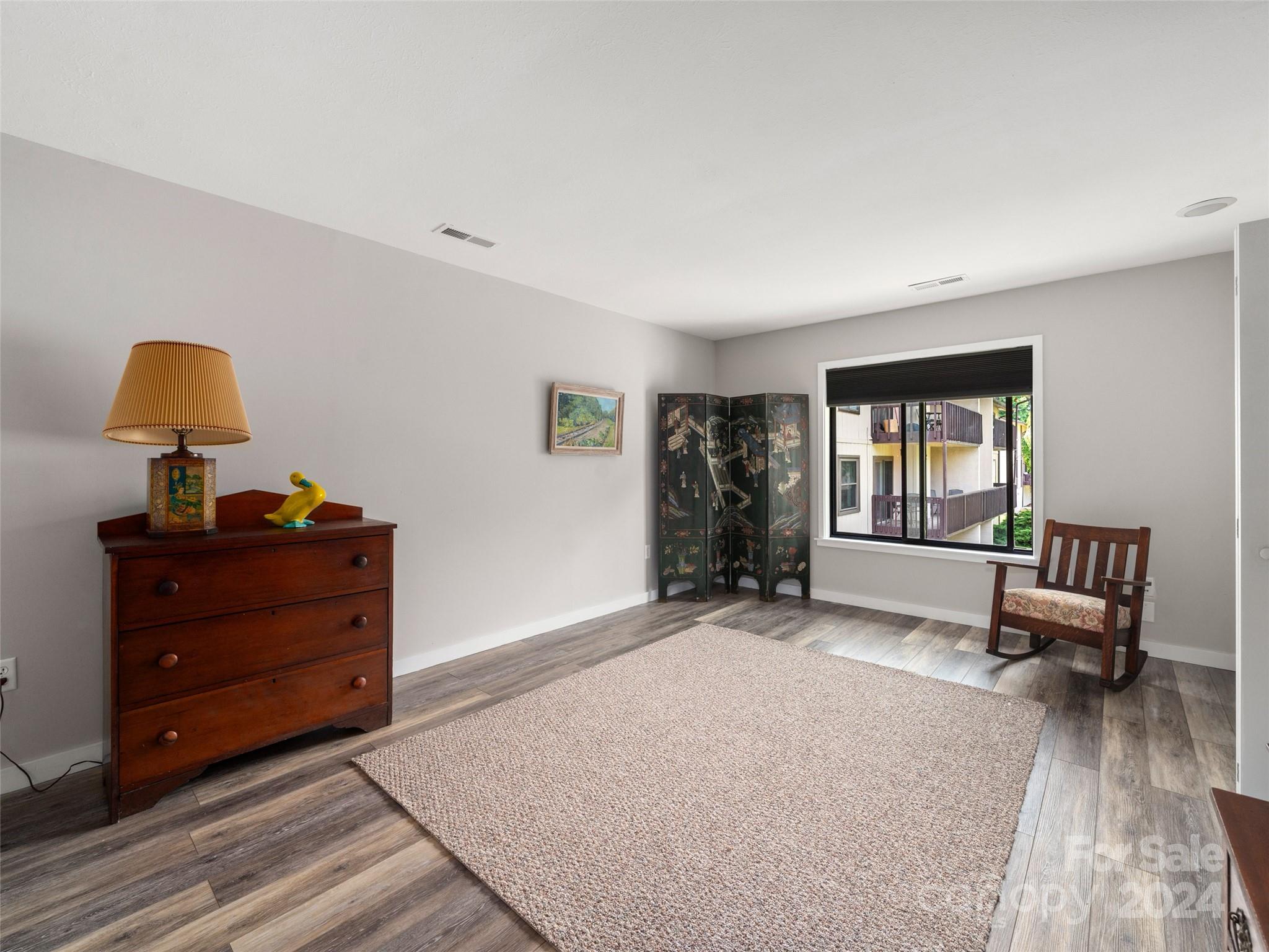 111 Shepard Square, Unit 608 Brevard, NC 28712 - Photo 13 of 29 a living room with furniture and a window