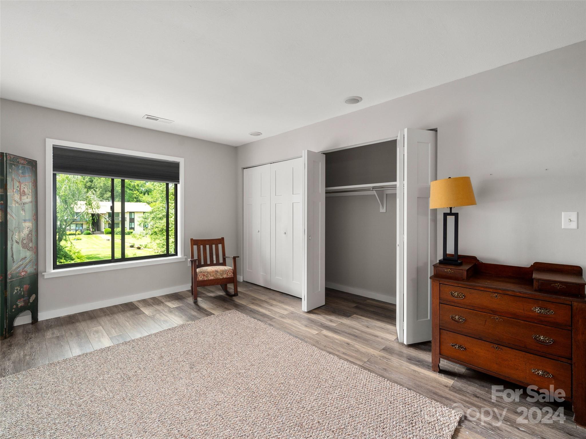 111 Shepard Square, Unit 608 Brevard, NC 28712 - Photo 14 of 29 a living room with furniture and a window