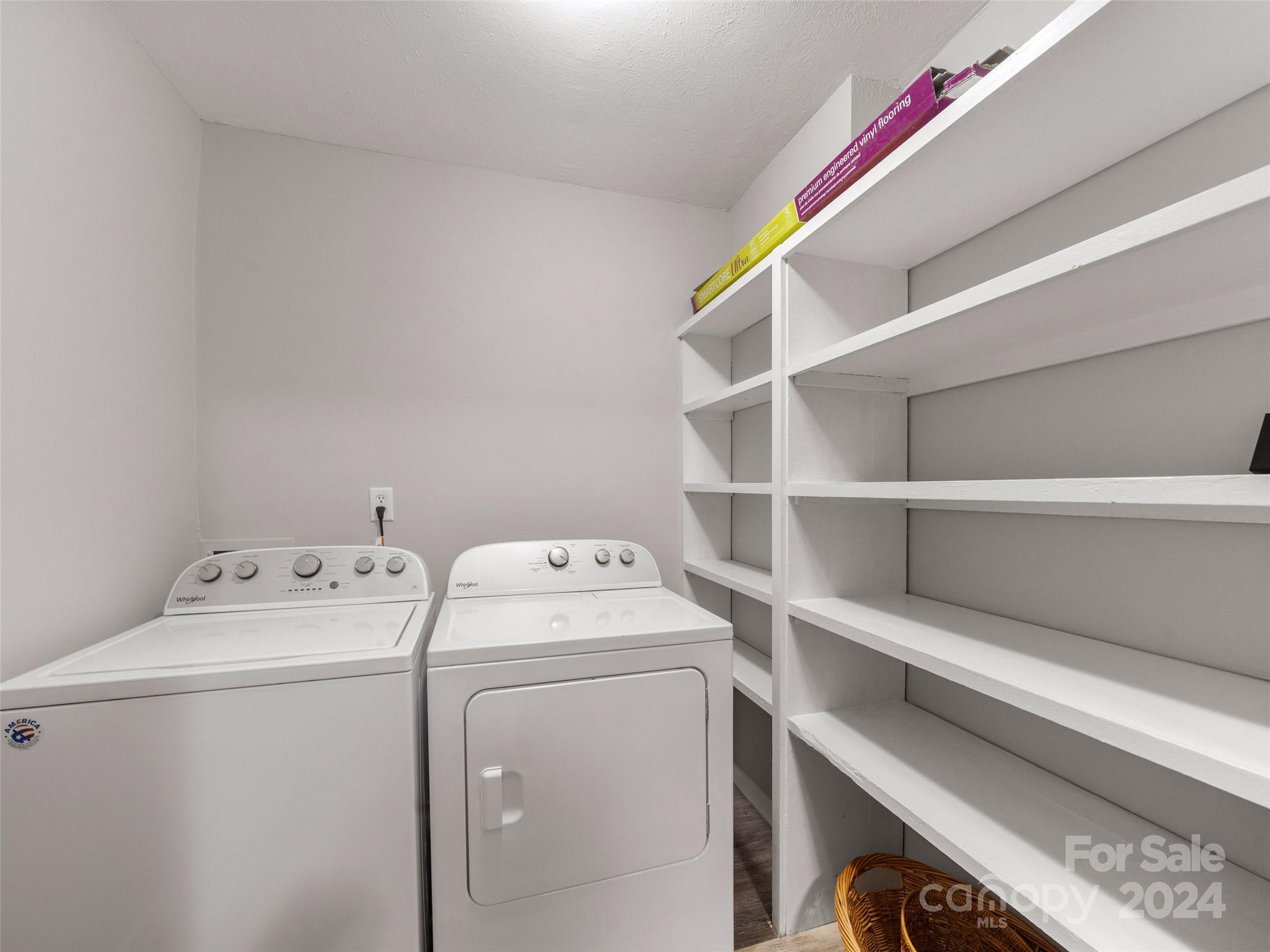 111 Shepard Square, Unit 608 Brevard, NC 28712 - Photo 9 of 29 a utility room with dryer and washer