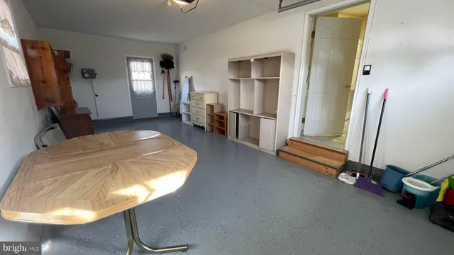 a room with furniture and a window