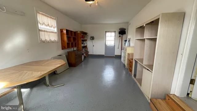 a view of a room with racks on the wall