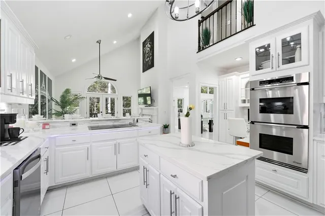 a kitchen with a sink and cabinets