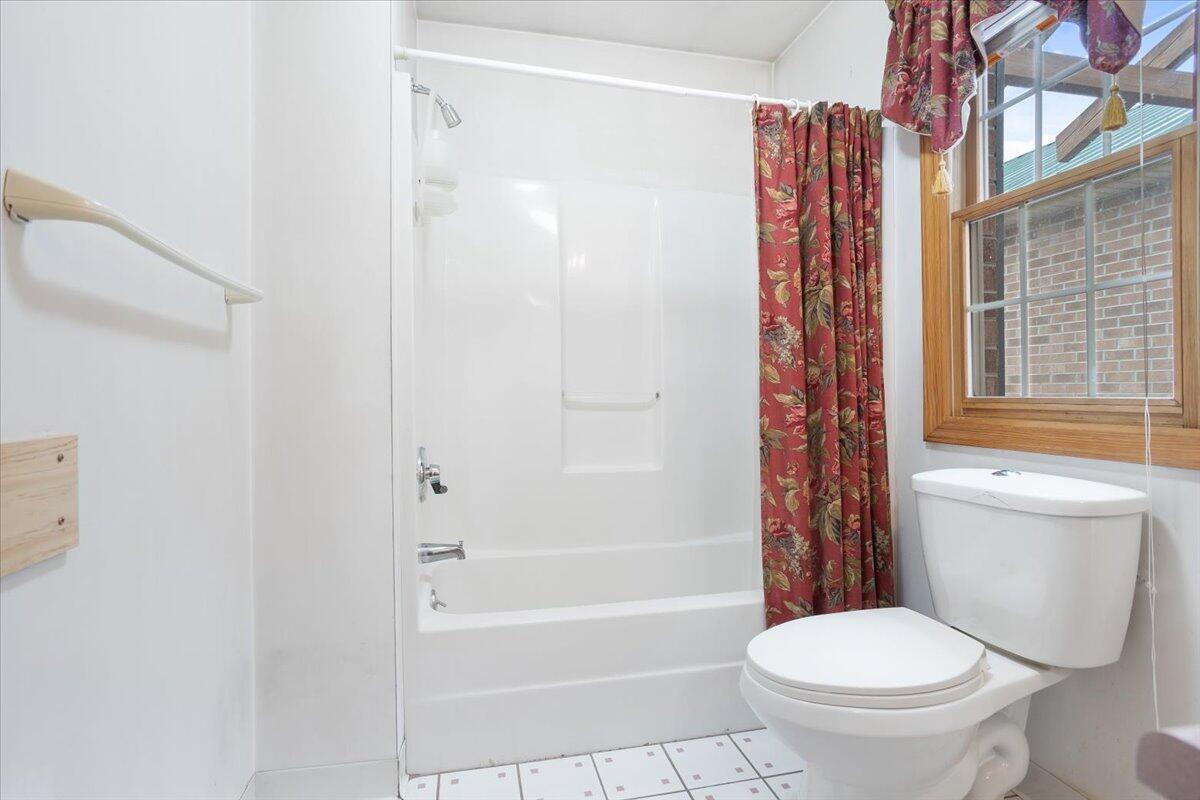 1940 Wetherburn Road Christiansburg, VA 24073 - Photo 26 of 43 a bathroom with a toilet and a shower