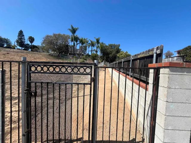 a view of a street with an outdoor space