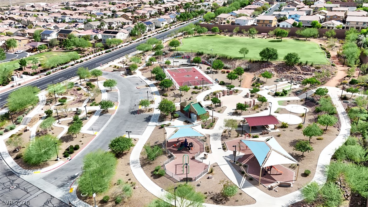 646 Monument Point Street Henderson, NV 89002 - Photo 43 of 44 An aerial perspective reveals a vibrant community park with extensive recreational facilities.