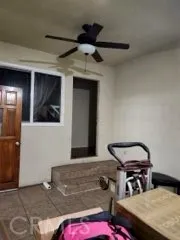 a large kitchen with kitchen island granite countertop a sink and cabinets