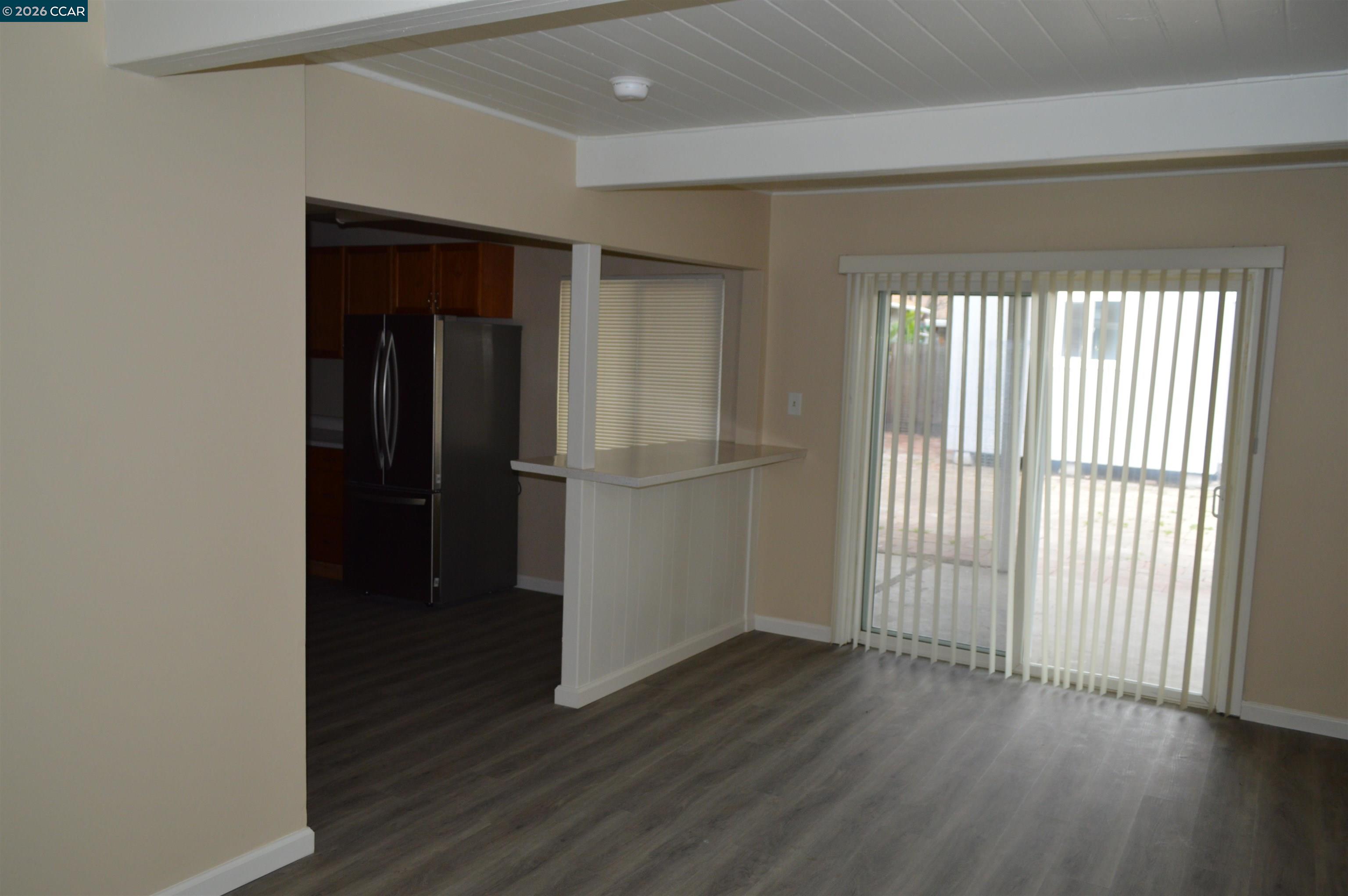 93 Beach Drive Bay Point, CA 94565 - Photo 4 of 9 a view of a hallway with wooden floor and closet