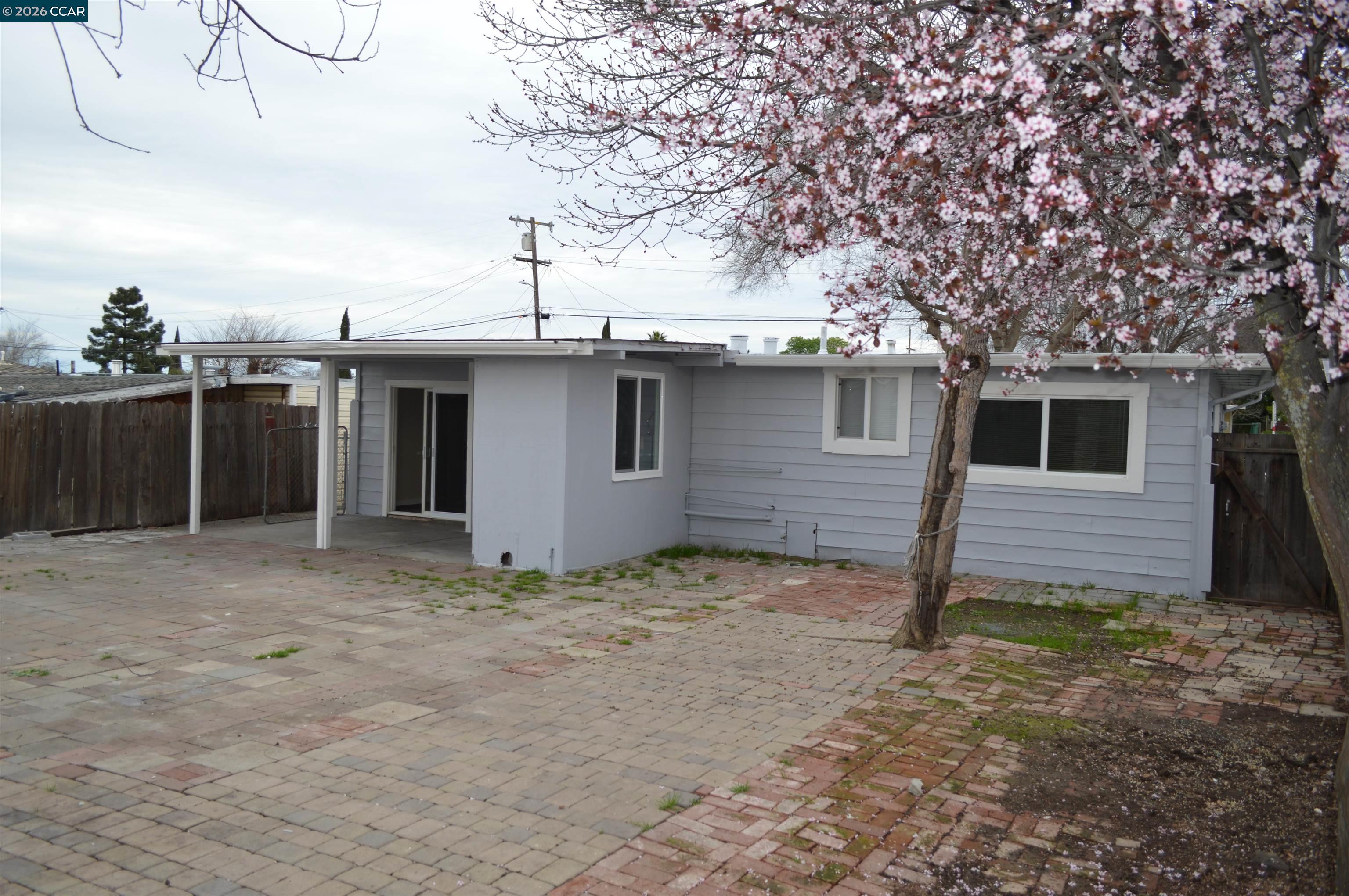93 Beach Drive Bay Point, CA 94565 - Photo 7 of 9 a backyard of a house