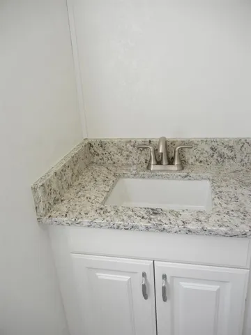 a view of washer and tap