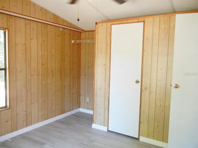 a view of a bathroom with a shower and a curtain