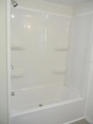 a close up of a bathtub in a bathroom