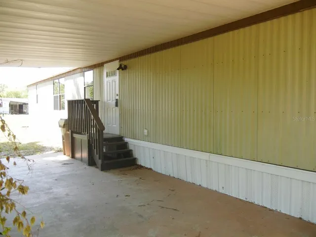 a view of yard covered with snow