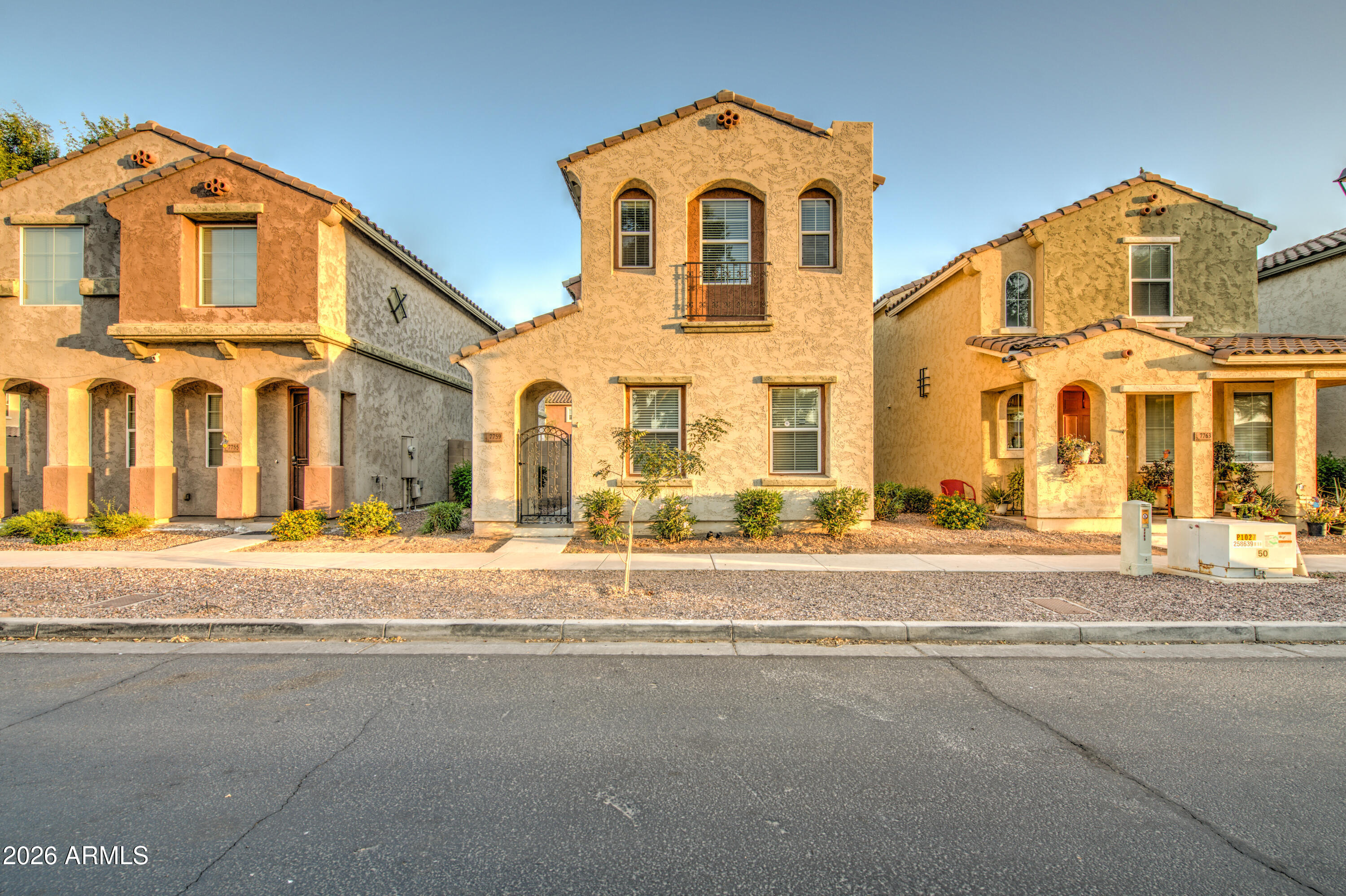 7759 West Monte Vista Road Phoenix, AZ 85035 - Photo 3 of 43 front view of a house with a yard