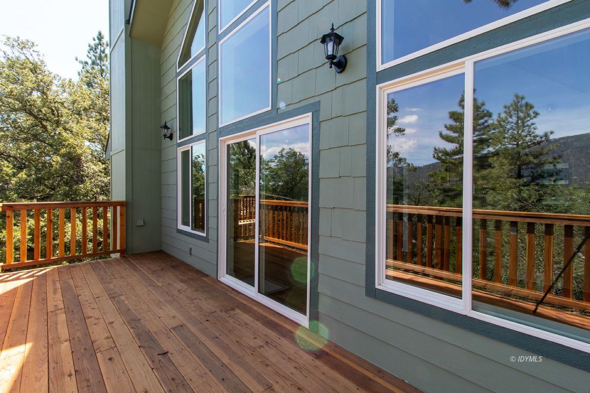 53610 Jeffery Pine Road Idyllwild, CA 92549 - Photo 19 of 38 Reflections of the mountain on the glass
