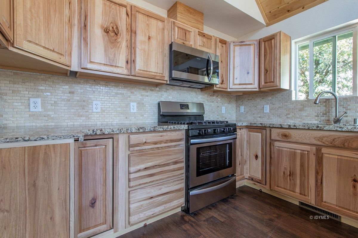 53610 Jeffery Pine Road Idyllwild, CA 92549 - Photo 21 of 38 Hickory cabinets + granite counter tops