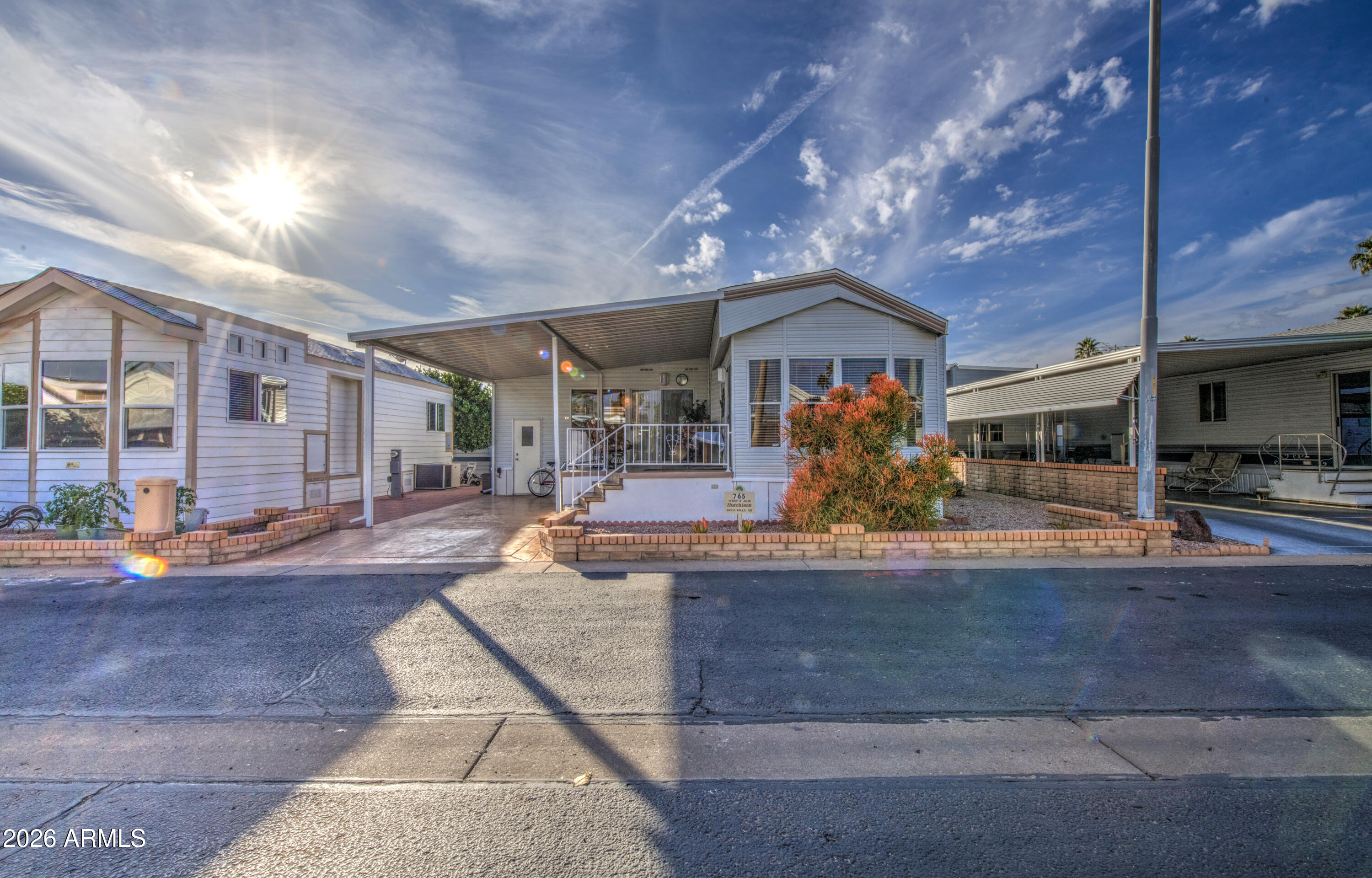 111 South Greenfield Road, Unit 765 Mesa, AZ 85206 - Photo 3 of 31 a view of a living room and entryway