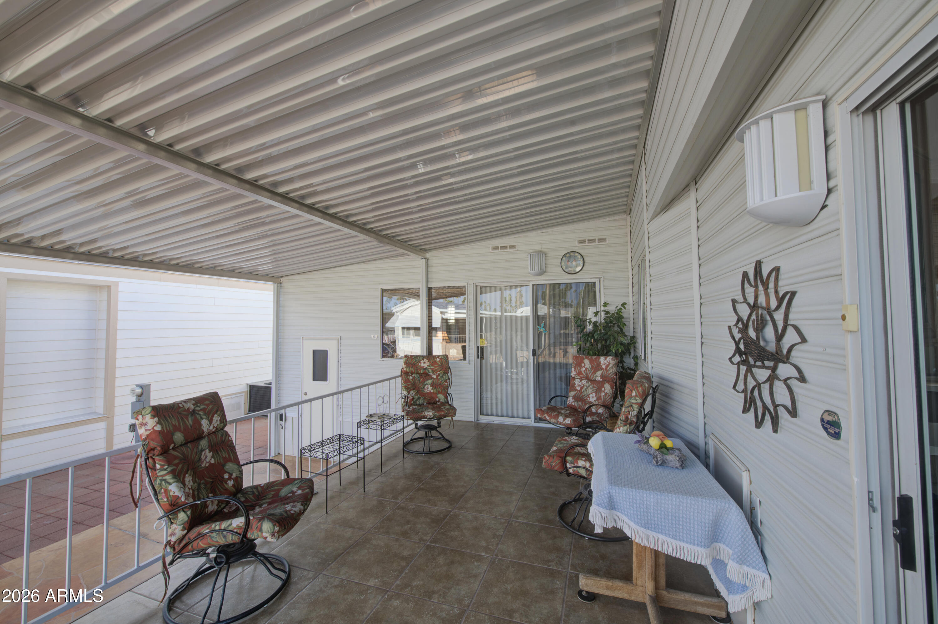 111 South Greenfield Road, Unit 765 Mesa, AZ 85206 - Photo 5 of 31 a view of a room with gym equipment