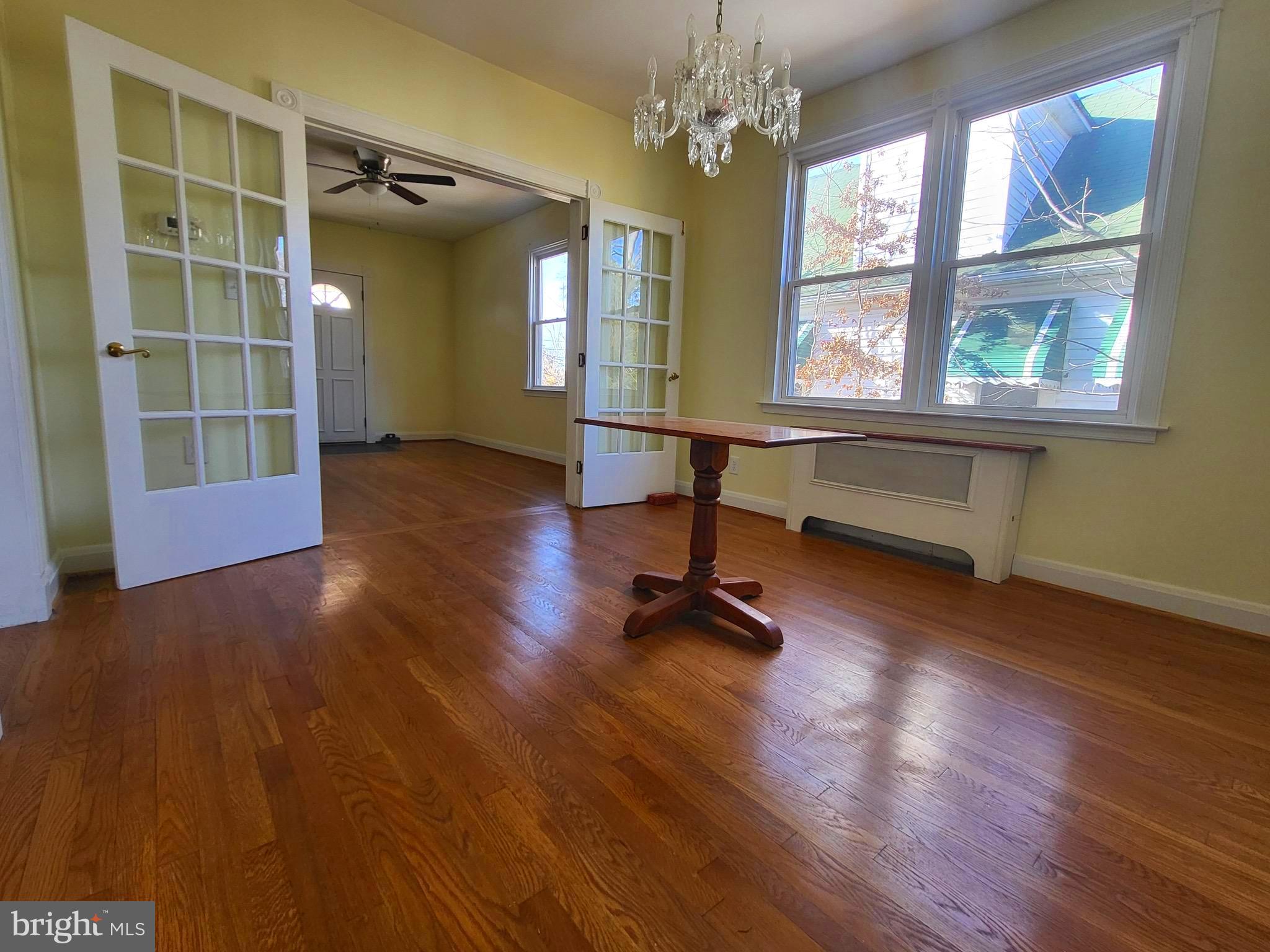 3108 Texas Avenue Baltimore, MD 21234 - Photo 12 of 34 a view of a room with wooden floor and windows