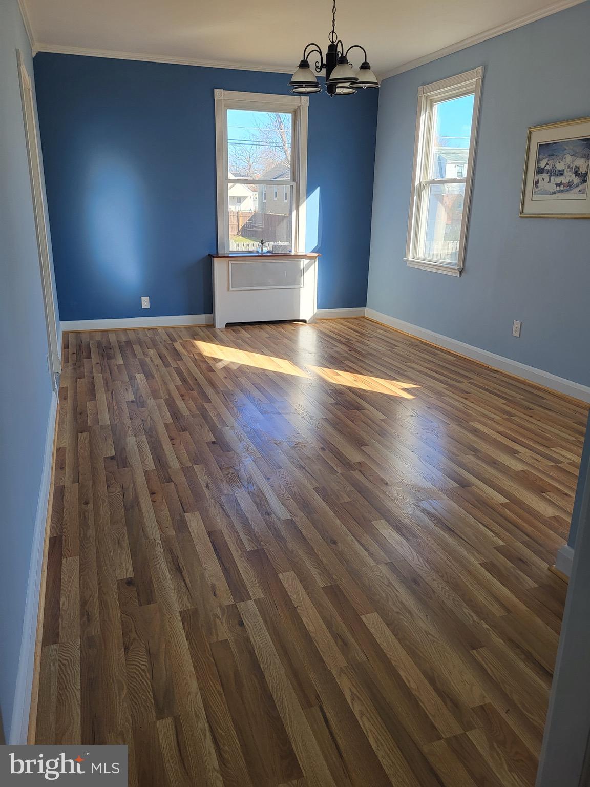 3108 Texas Avenue Baltimore, MD 21234 - Photo 20 of 34 a view of wooden floor and windows in a room