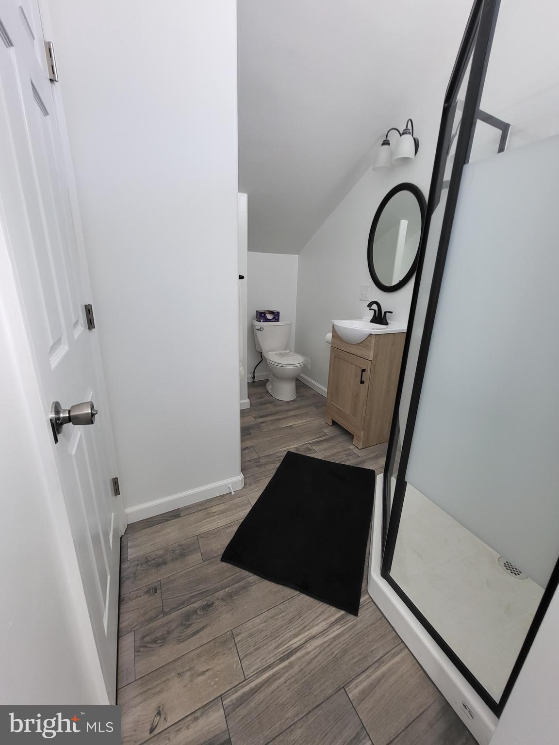 3108 Texas Avenue Baltimore, MD 21234 - Photo 24 of 34 a bathroom with a sink and a mirror