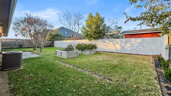 a garden view with a seating space