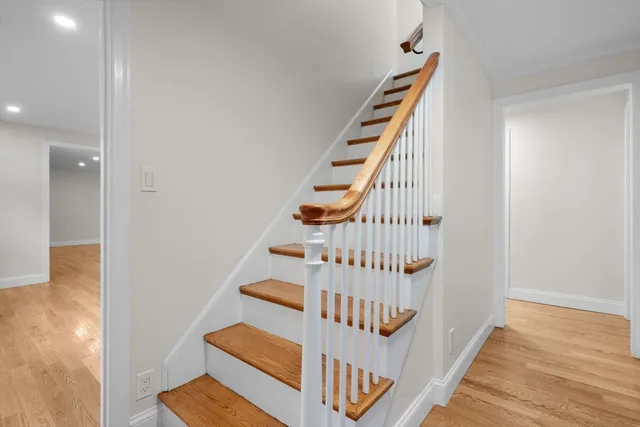 a view of entryway with wooden floor