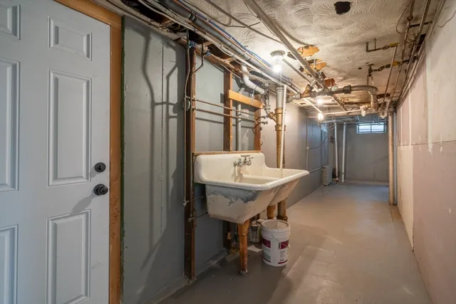 a bathroom with a sink and mirror