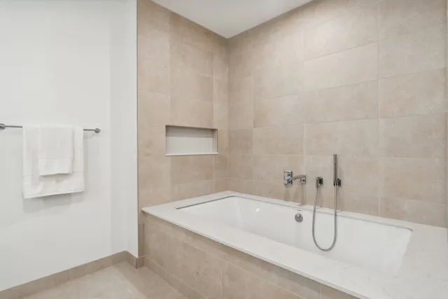 a bathroom with a bathtub