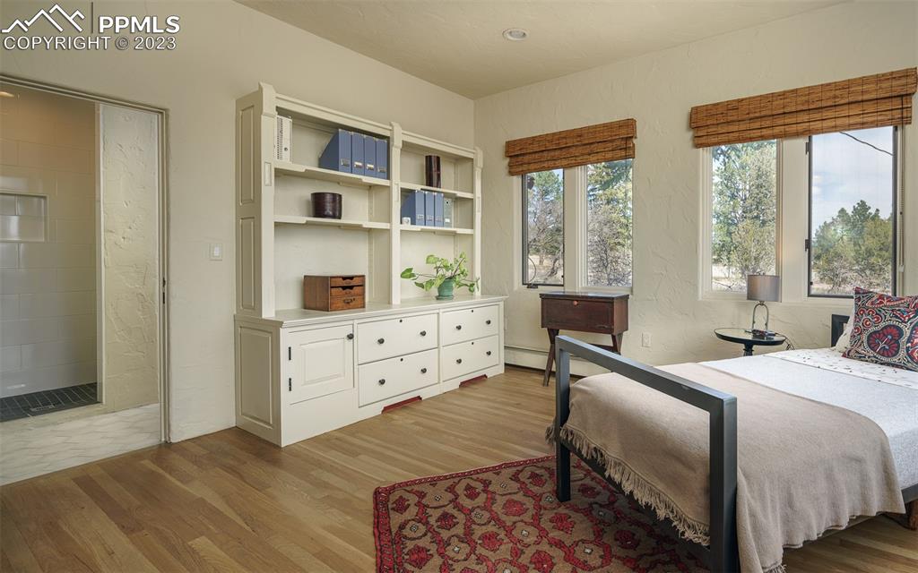 52 Marland Road Colorado Springs, CO 80906 - Photo 24 of 48 a bedroom with a bed and a window