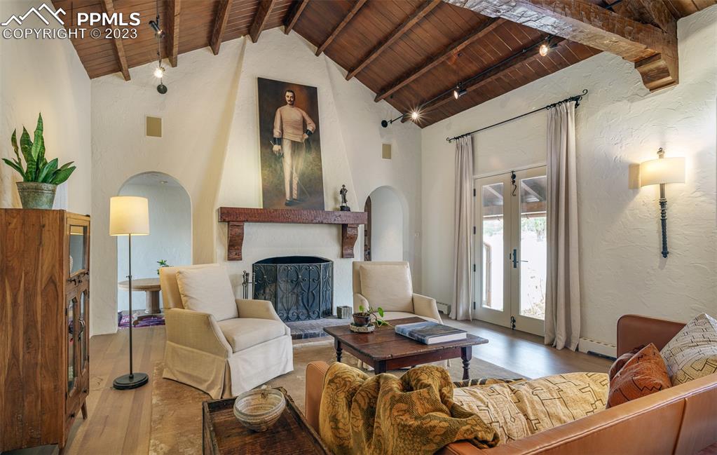 52 Marland Road Colorado Springs, CO 80906 - Photo 3 of 48 a living room with furniture and a fireplace