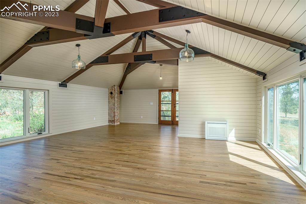 52 Marland Road Colorado Springs, CO 80906 - Photo 31 of 48 a view of empty room with wooden floor and fan