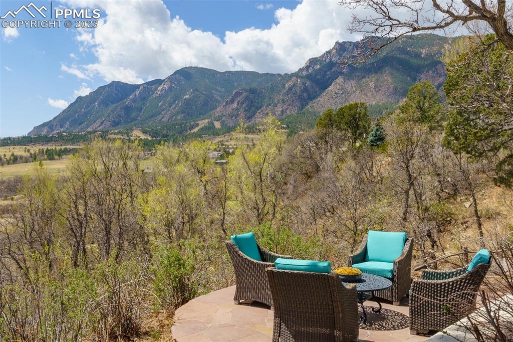 52 Marland Road Colorado Springs, CO 80906 - Photo 34 of 48 a view of a chairs and table in the patio