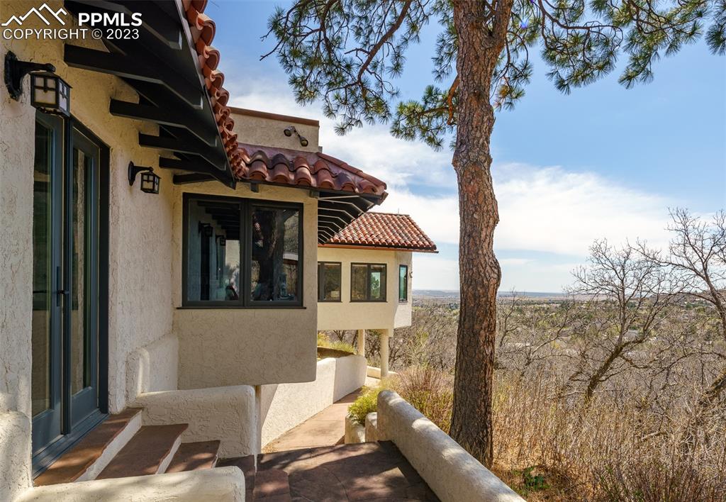 52 Marland Road Colorado Springs, CO 80906 - Photo 35 of 48 a view of a house with a large tree
