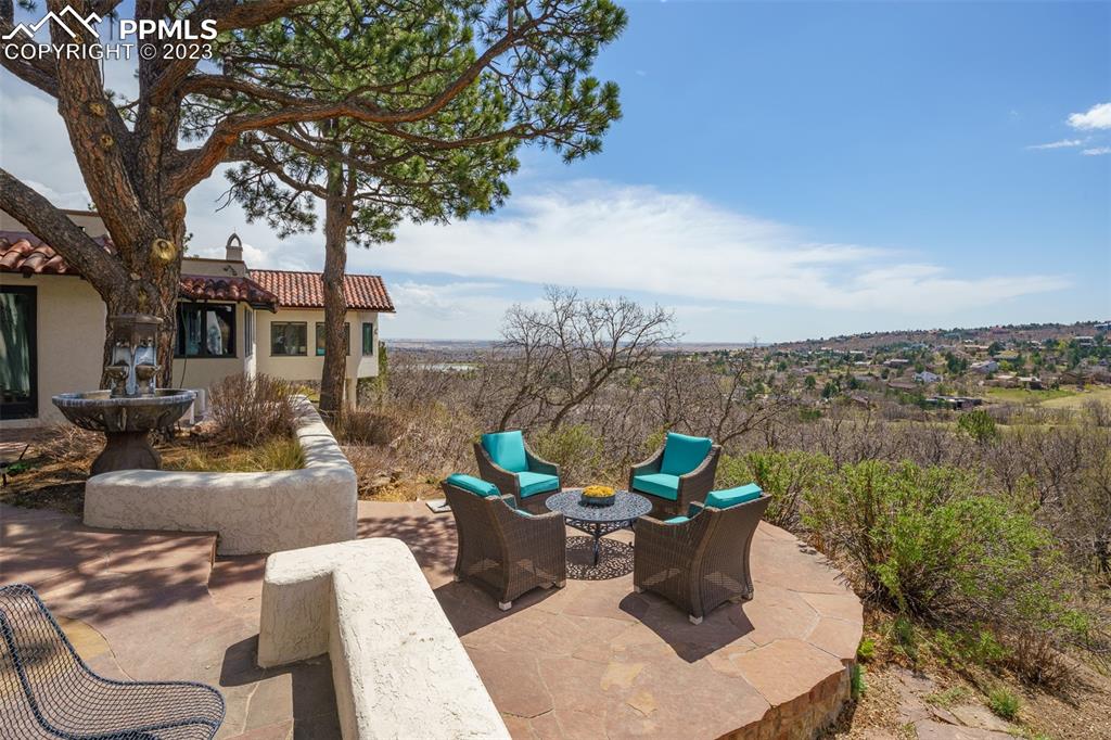 52 Marland Road Colorado Springs, CO 80906 - Photo 36 of 48 a terrace with outdoor seating and city view