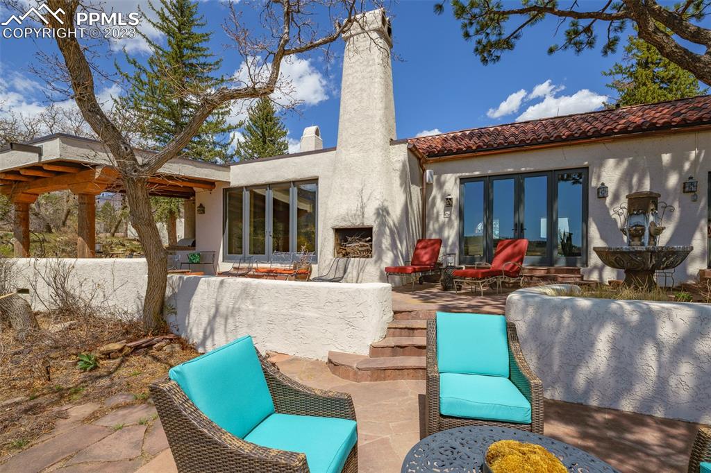 52 Marland Road Colorado Springs, CO 80906 - Photo 40 of 48 a view of a chairs and table in a patio