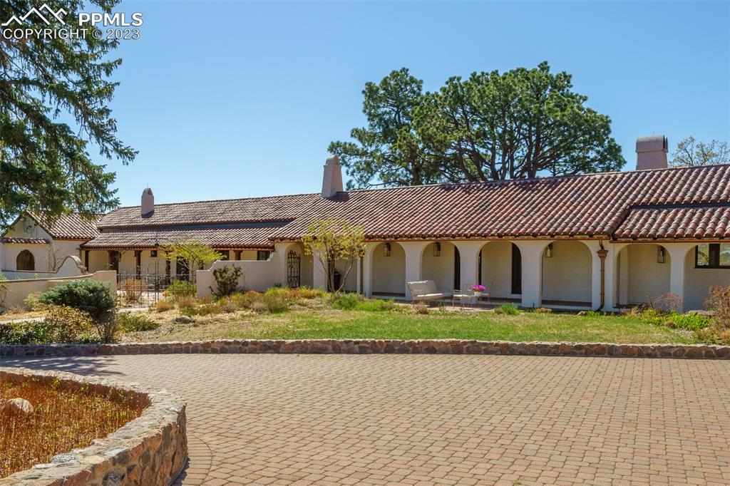 52 Marland Road Colorado Springs, CO 80906 - Photo 41 of 48 a front view of a house with a garden